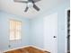 Comfortable bedroom with hardwood floors, a ceiling fan and closet at 1735 S Wyandot St, Denver, CO 80223