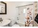 Bright bathroom features white subway tile and shower at 1271 Uinta St, Denver, CO 80220