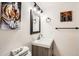Bathroom features updated vanity, hardware, and modern lighting at 1271 Uinta St, Denver, CO 80220