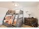 Cozy bedroom features bunk beds and ample closet space at 1271 Uinta St, Denver, CO 80220