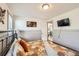 Comfortable bedroom boasts modern decor and natural light at 1271 Uinta St, Denver, CO 80220