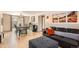 Open-concept living and dining area with hardwood floors and modern decor at 1271 Uinta St, Denver, CO 80220