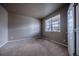 Neutral bedroom with carpet, and a window offering natural light at 19347 E 65Th Ave, Aurora, CO 80019