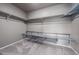 Organized walk-in closet with shelving and drawers, providing ample storage space at 19347 E 65Th Ave, Aurora, CO 80019