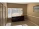 Bedroom featuring a dresser and multiple closets with sliding doors at 8430 Little Rock Way # 102, Highlands Ranch, CO 80126