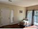 Cozy living space with a door to the outside, wall decor, and natural light streaming in, comfy for relaxing at 8430 Little Rock Way # 102, Highlands Ranch, CO 80126