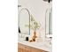 Modern bathroom features double sinks, arched mirrors, and stylish decor at 2736 N Clay St, Denver, CO 80211