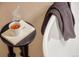 Relaxing spa-like bathroom scene featuring a teacup, book, and towel at 2736 N Clay St, Denver, CO 80211