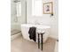 Clean bathroom featuring a modern soaking tub and stylish fixtures at 2736 N Clay St, Denver, CO 80211