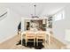 Bright open-concept dining area flows seamlessly into a modern kitchen, creating a stylish and functional living space at 2736 N Clay St, Denver, CO 80211