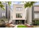 Modern home featuring unique architectural details and a well-manicured front yard at 2736 N Clay St, Denver, CO 80211