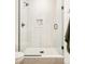 Modern shower featuring glass door, chrome fixtures and tiled walls at 2736 N Clay St, Denver, CO 80211