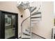 Unique metal spiral staircase with deck access, a modern architectural feature at 2736 N Clay St, Denver, CO 80211