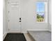 Bright entryway with neutral tones, providing a clean and modern first impression at 14952 Gladshine Dr, Parker, CO 80134