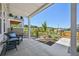 Welcoming porch with comfortable seating, offering a relaxing outdoor space with landscaped views at 14952 Gladshine Dr, Parker, CO 80134