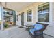 Cozy front porch with a comfortable chair, perfect for relaxing and enjoying the neighborhood views at 14952 Gladshine Dr, Parker, CO 80134