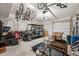 Spacious garage with high ceilings and ample storage for bikes and a golf cart at 14952 Gladshine Dr, Parker, CO 80134
