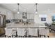 Close up of the kitchen with stainless steel stove and gray cabinets at 14952 Gladshine Dr, Parker, CO 80134