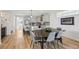Modern kitchen featuring stainless steel appliances and a large island with bar seating at 14952 Gladshine Dr, Parker, CO 80134