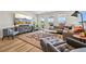 Spacious living room with modern decor and plenty of natural light, perfect for relaxation and entertainment at 14952 Gladshine Dr, Parker, CO 80134
