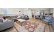 Bright and airy living room featuring a comfortable seating area and stylish decor at 14952 Gladshine Dr, Parker, CO 80134