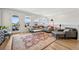 Bright living room with comfortable seating, ideal for relaxing and entertaining with friends and Gathering at 14952 Gladshine Dr, Parker, CO 80134