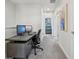 Office area features a modern desk with a computer and lots of open space at 14952 Gladshine Dr, Parker, CO 80134