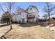 Backyard showing the exterior, deck, and landscaped yard at 8559 W 93Rd W Ct, Broomfield, CO 80021