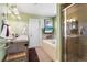 Bathroom with double sinks, soaking tub, and glass-enclosed shower at 8559 W 93Rd W Ct, Broomfield, CO 80021