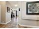 Inviting entryway with tile flooring and view into the spacious living area at 8559 W 93Rd W Ct, Broomfield, CO 80021