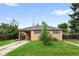 Charming single story home with a carport and a well-maintained lawn at 10505 Lowry Pl, Aurora, CO 80010