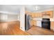 Efficient kitchen featuring stainless steel appliances and wood cabinets at 10505 Lowry Pl, Aurora, CO 80010