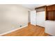 Laundry room with washer, hardwood floors and closet provide practical convenience at 10505 Lowry Pl, Aurora, CO 80010