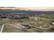 Wide aerial view of a Primary-planned community and surrounding open space at 5211 Routt Ct, Arvada, CO 80002