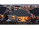 Relaxing backyard with a cozy covered patio, a soothing hot tub, and well-maintained perimeter fence at 5211 Routt Ct, Arvada, CO 80002