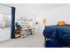 Cozy bedroom featuring a bunk bed and desk area at 5211 Routt Ct, Arvada, CO 80002