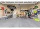 Organized two-car garage with ample storage space and overhead racks at 5211 Routt Ct, Arvada, CO 80002