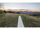 Scenic walking path with mountain views at sunset at 5211 Routt Ct, Arvada, CO 80002