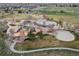 Aerial photo of an amazing community playground with slides, swings, and green space at 5211 Routt Ct, Arvada, CO 80002