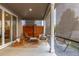Cozy porch area with chairs, a hammock, and decorative screens for added privacy at 5211 Routt Ct, Arvada, CO 80002