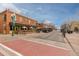 Exterior view of shops in Olde Town Arvada, showing outdoor dining and pedestrian-friendly streets at 5211 Routt Ct, Arvada, CO 80002