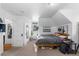 Bright bedroom with clean white walls and a bed with ample storage underneath at 930 E 7Th Ave, Denver, CO 80218
