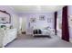 Light and airy bedroom with hardwood floors and a daybed at 930 E 7Th Ave, Denver, CO 80218