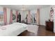 Bright bedroom with hardwood floors and access to a private balcony at 930 E 7Th Ave, Denver, CO 80218