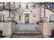 Inviting front entrance with tiled patio and ornate door at 930 E 7Th Ave, Denver, CO 80218