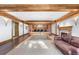 Finished basement with a pool table, fireplace, and comfortable seating at 930 E 7Th Ave, Denver, CO 80218