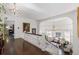 Stunning hallway showcasing hardwood floors and a grand staircase at 930 E 7Th Ave, Denver, CO 80218
