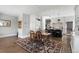 Spacious kitchen and breakfast area with hardwood floors and a charming area rug at 930 E 7Th Ave, Denver, CO 80218