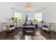 Bright living room with bay window, hardwood floors, and comfy seating at 930 E 7Th Ave, Denver, CO 80218