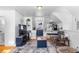 Open living room with kitchen and sitting area at 930 E 7Th Ave, Denver, CO 80218